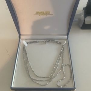 silver necklace and bracelet